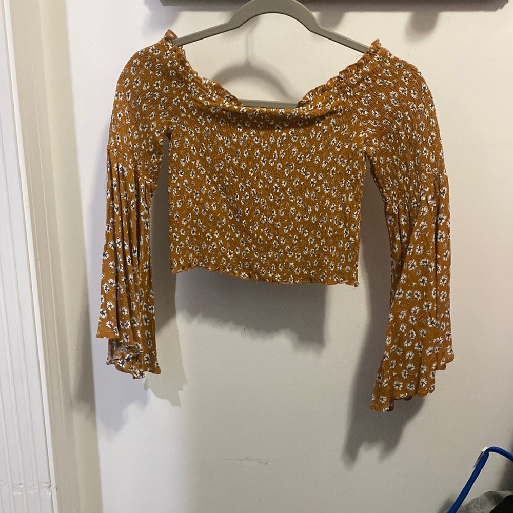 Forever 21 cropped, off the shoulder, flowy arms top. Flowery.